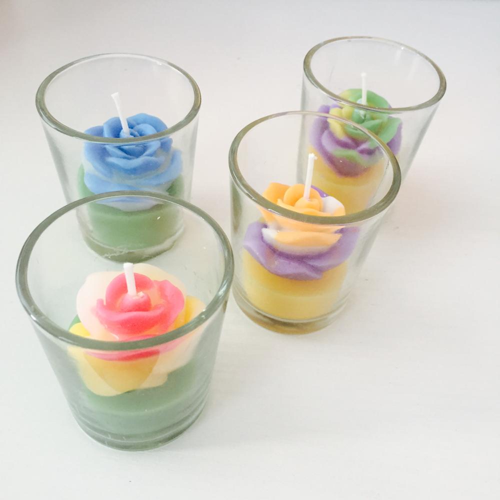 Multi color flower shape custom candle in a jar