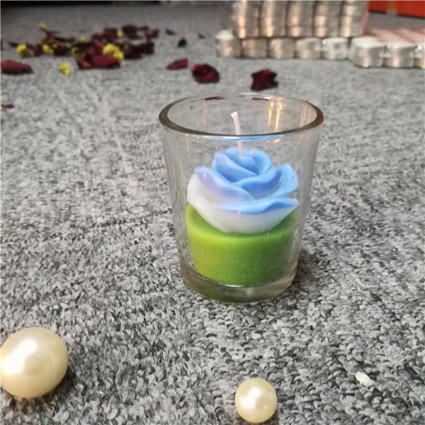 Multi colored custom flower candles in glass jar