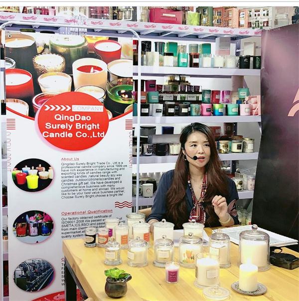 How did Surely Bright Candle Company show candles in 128th Canton Fair in 2020?