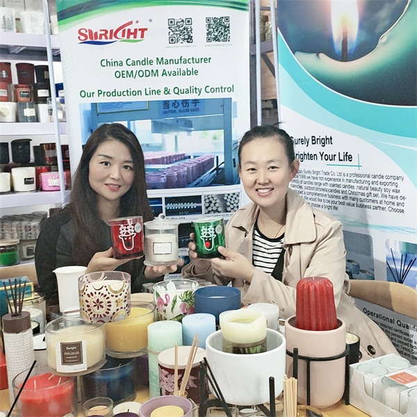 How did Surely Bright Candle Company show candles in 128th Canton Fair in 2020?